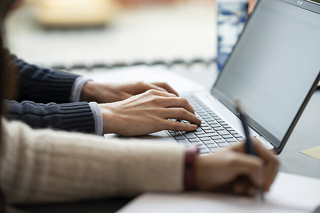 two people working at a desk